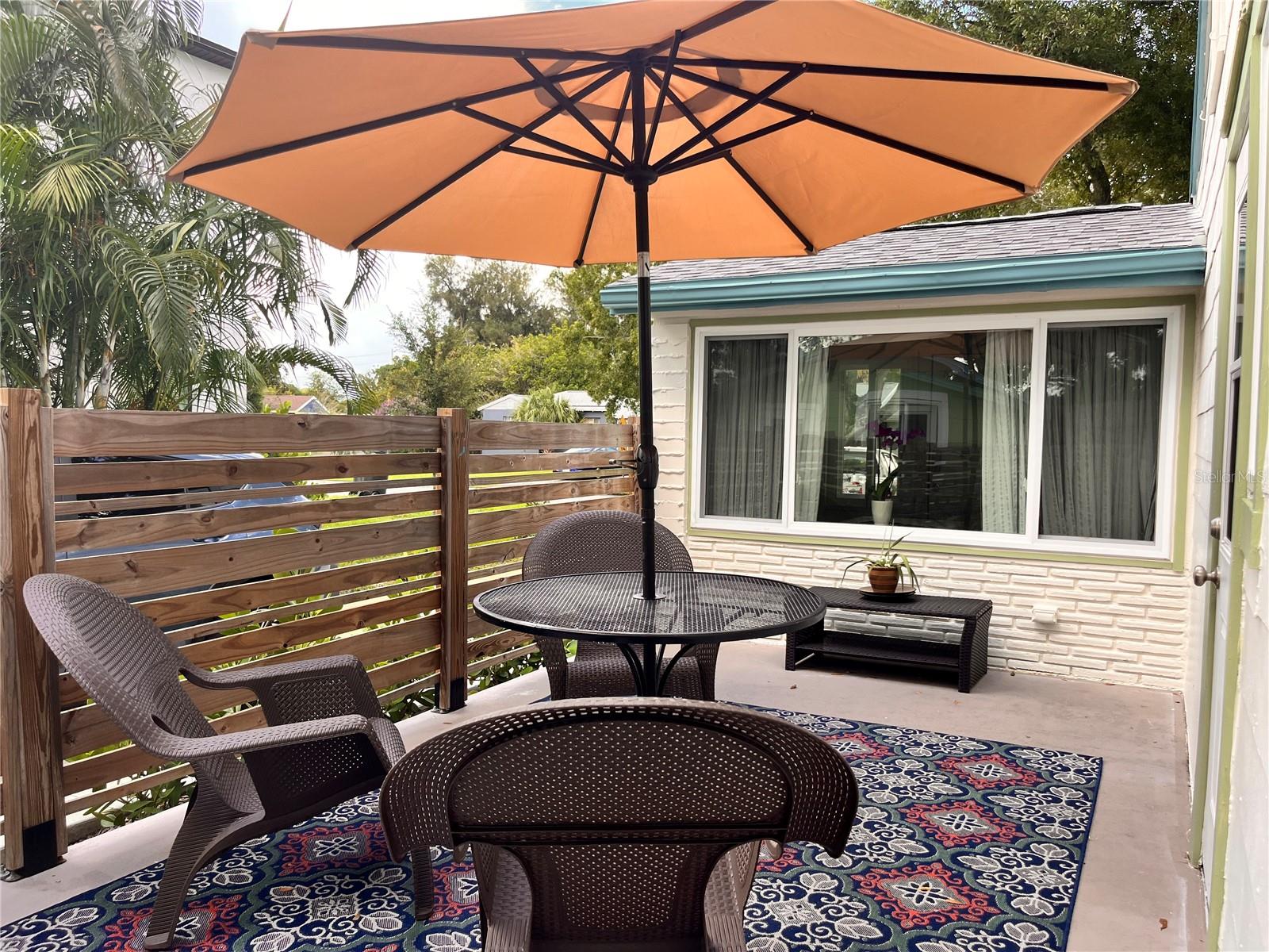 Concrete patio, window to foyer/dining