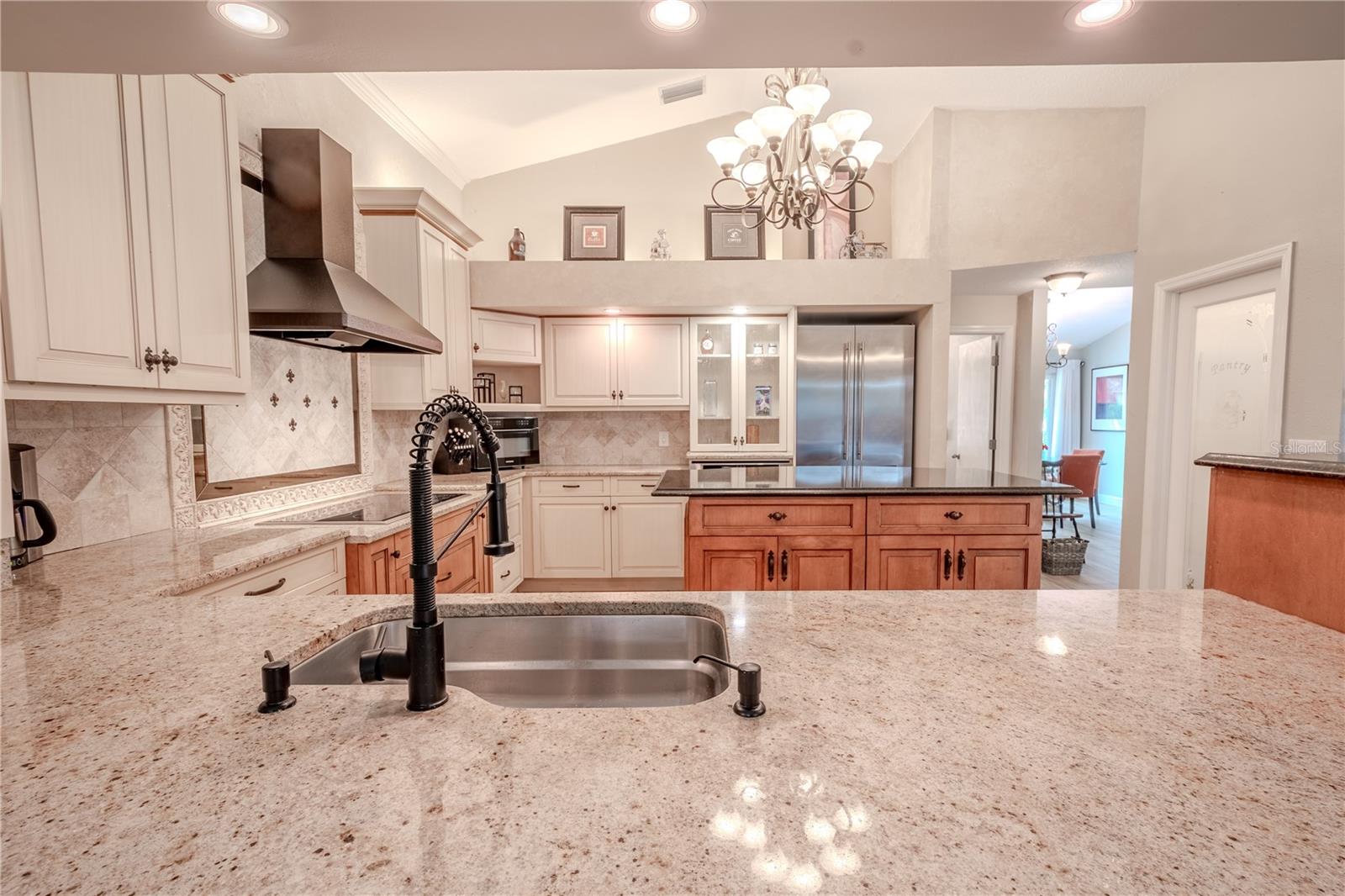 The kitchen has high ceilings.