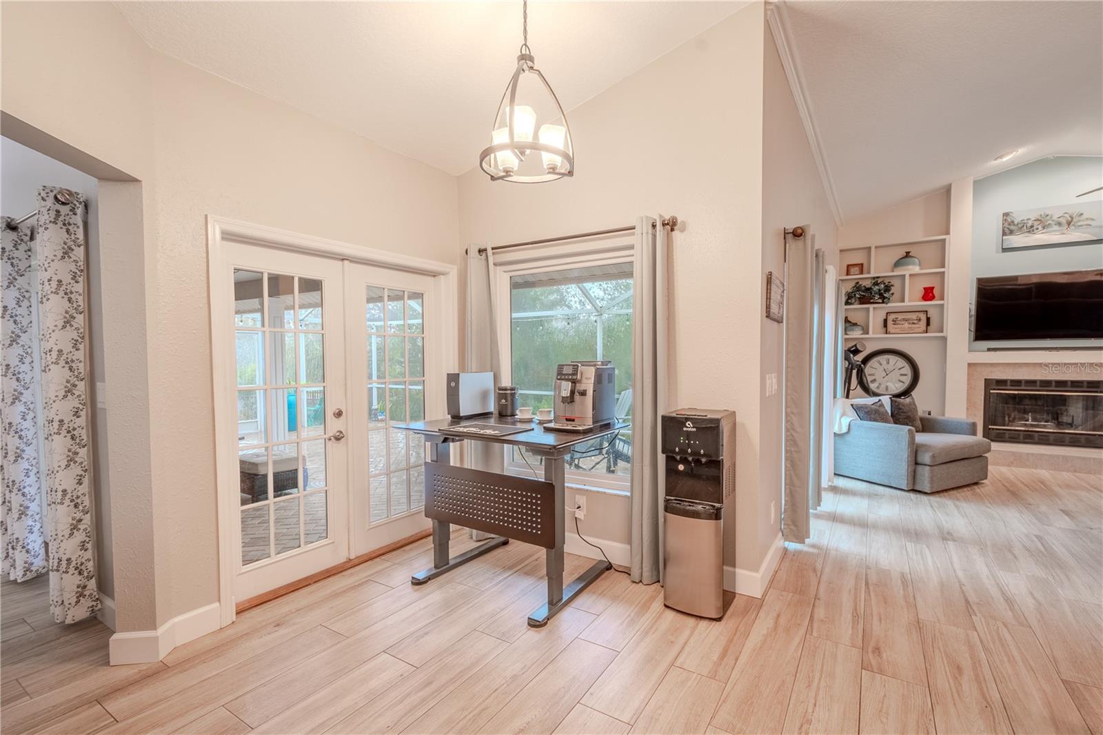 The breakfast nook has French doors that lead to the screened in lanai.