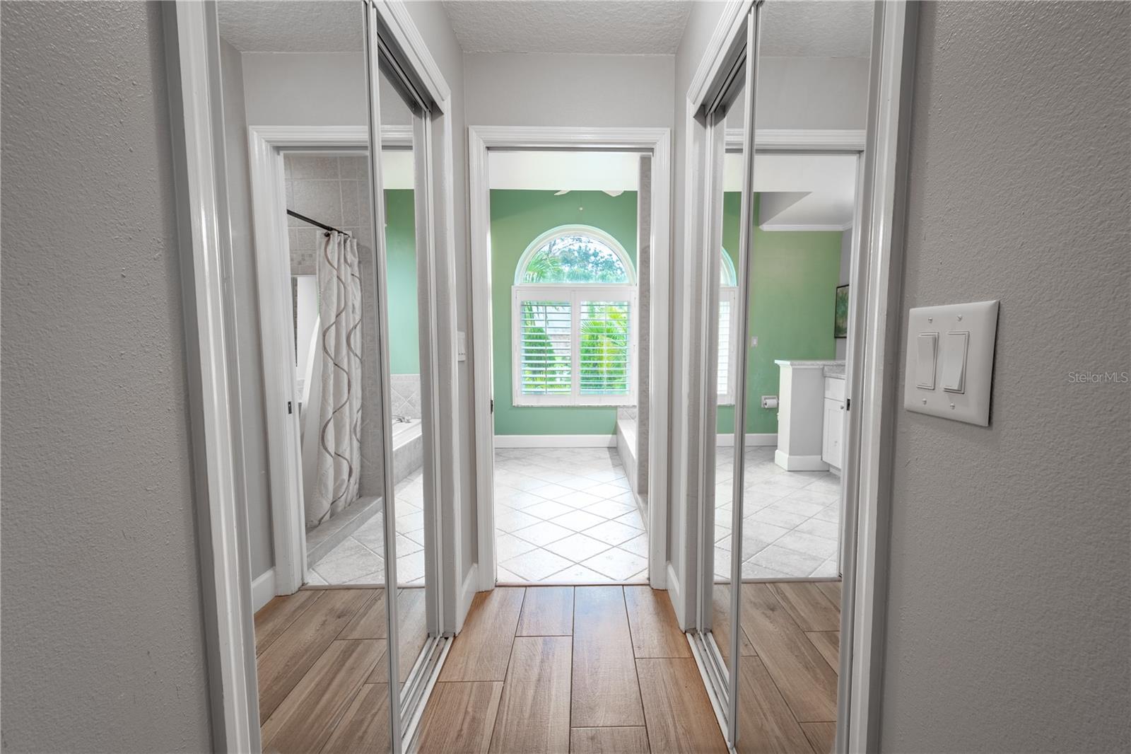 The primary bedroom features dual walk-in closets.