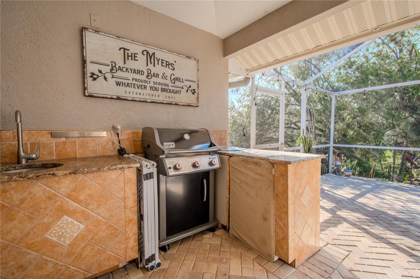 All you need is your grill to create a lovely outdoor kitchen.