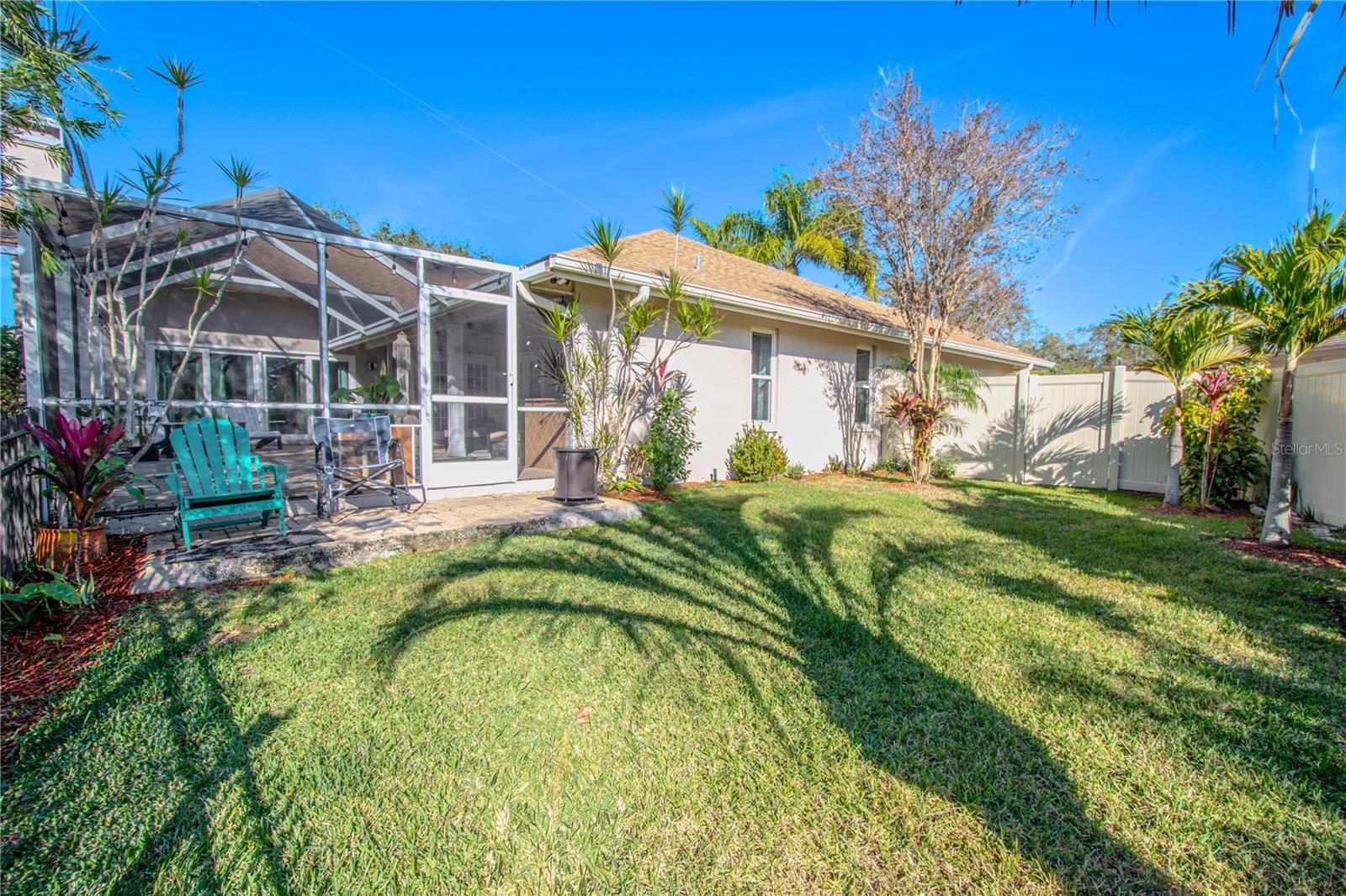 Mature landscaping and fenced in backyard.