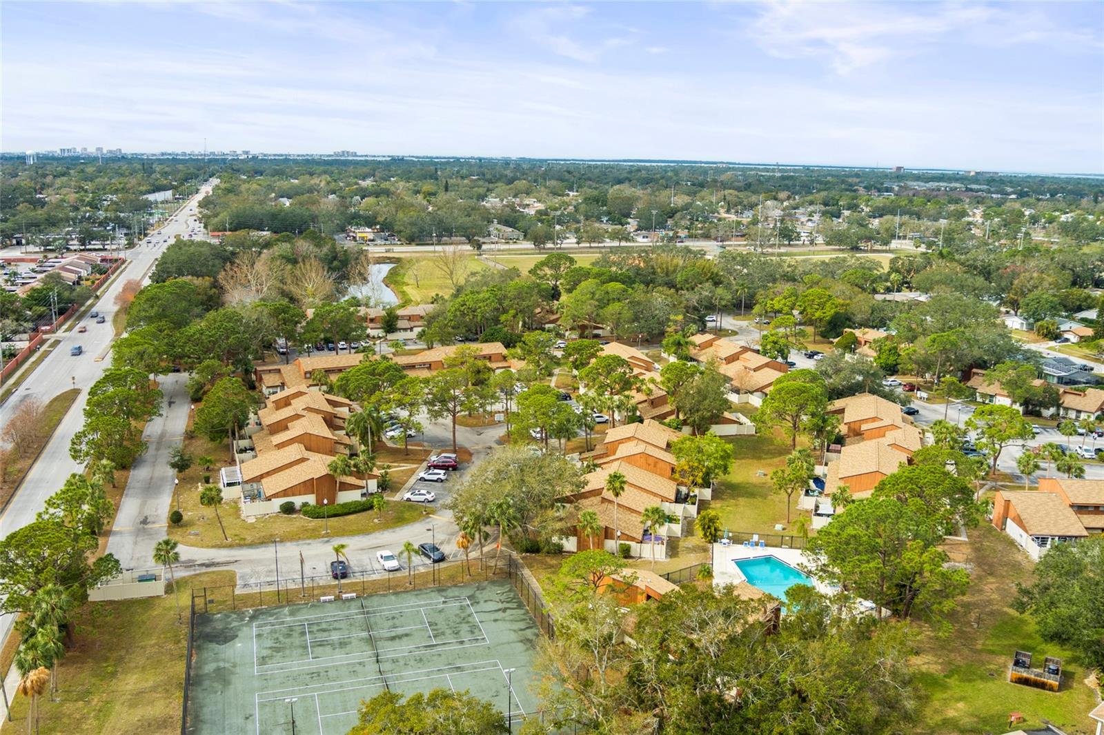 Ariel view of the Woodlake community surrounded beautiful oaks and landscaping.