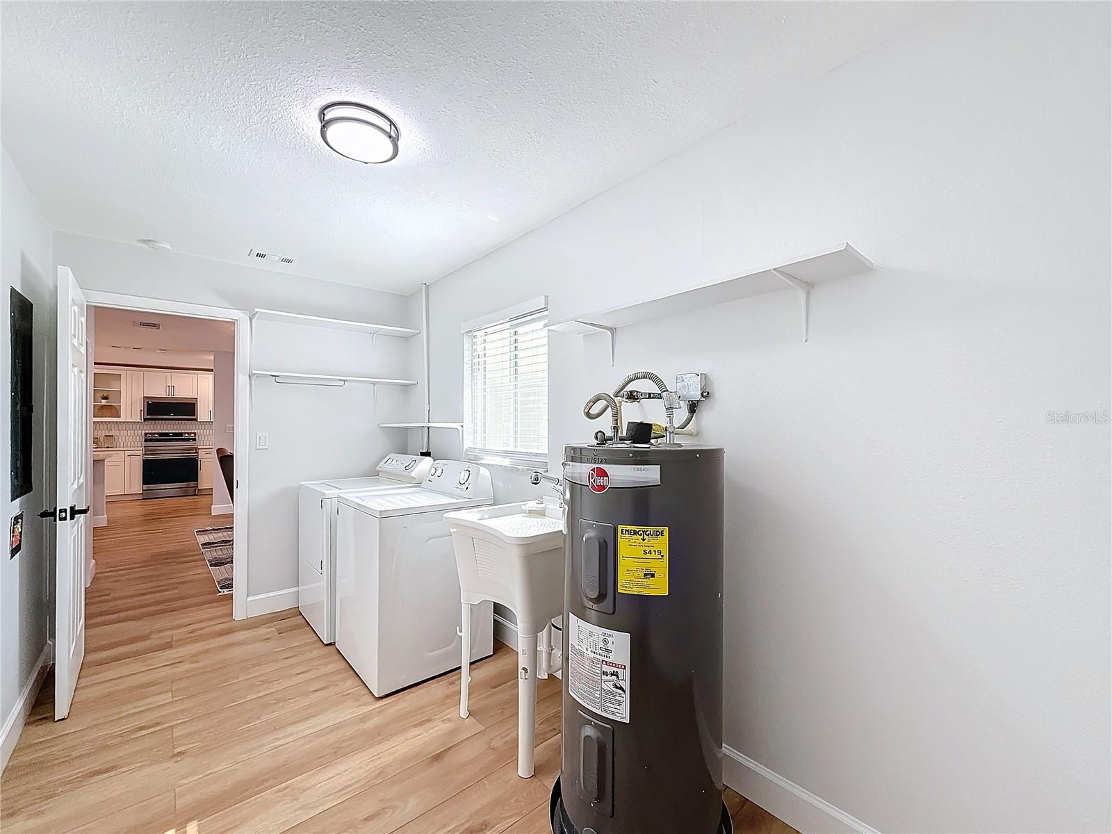 LAUNDRY ROOM WITH UTILITY SINK