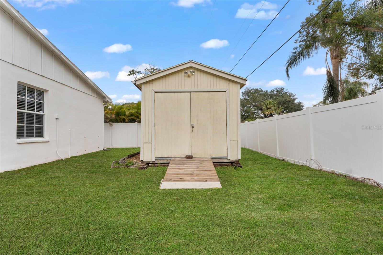 12x16 shed has running water, electric and window a/c