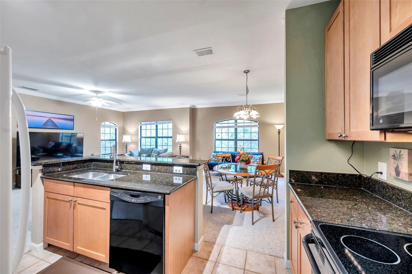 Kitchen with granite coutertops and wood cabinets