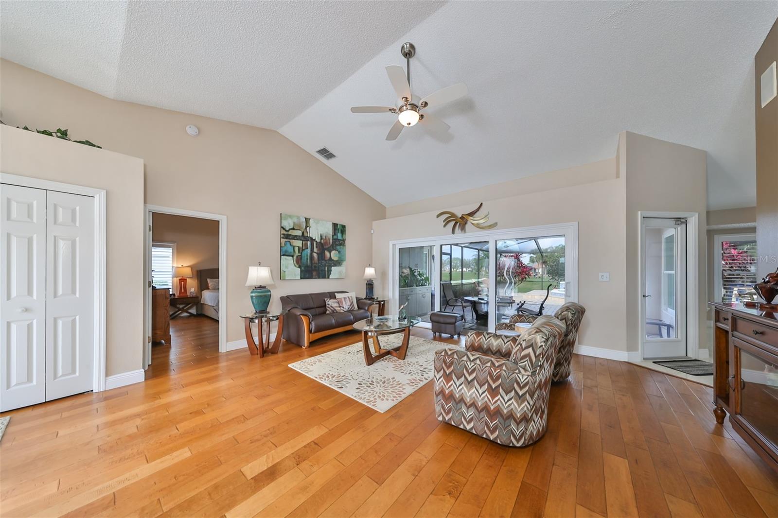 Living Room W/ Beautiful Engineered Honed Wood Flooring Flooring