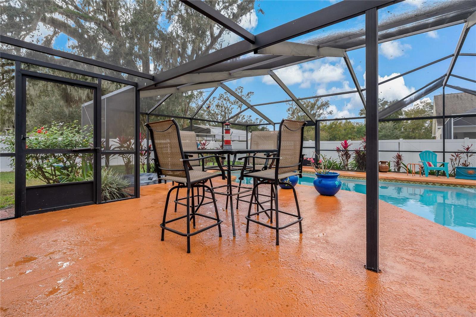 Pool Deck with room for a poolside table and chairs.