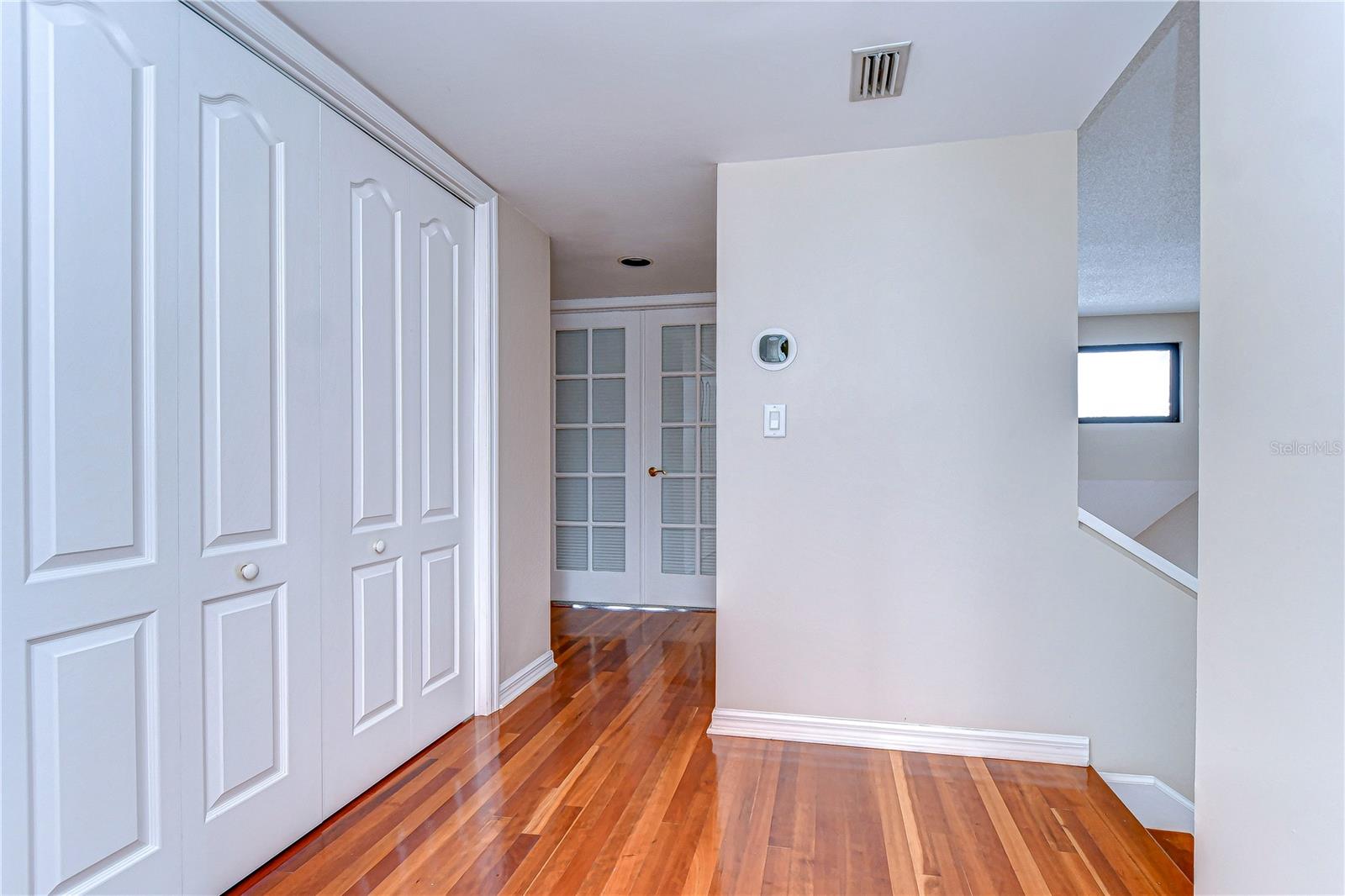 Upstairs hall looking towards primary bedroom