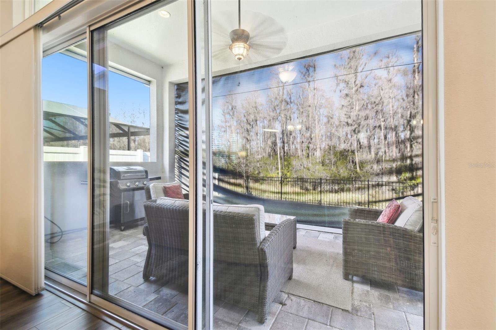 Sliding Glass Doors leading to the Covered Lanai