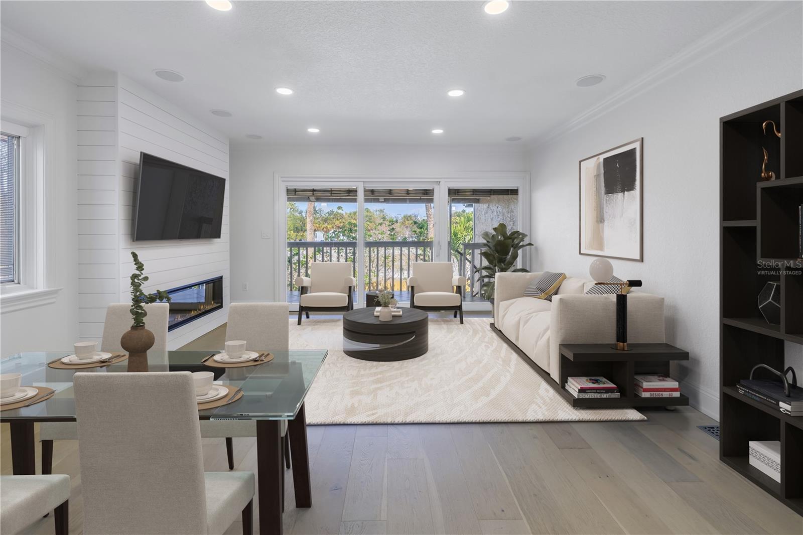 Virtually Staged: living area has recessed lighting, crown molding, built-in speakers