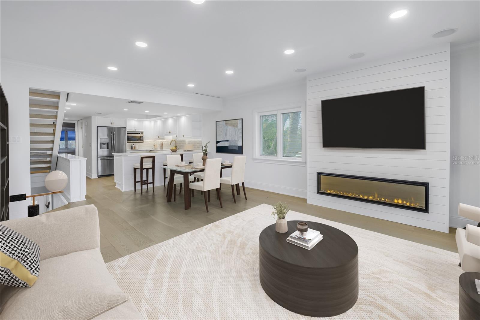 Virtually staged: Living room is open to the dining area which is a great entertainment space