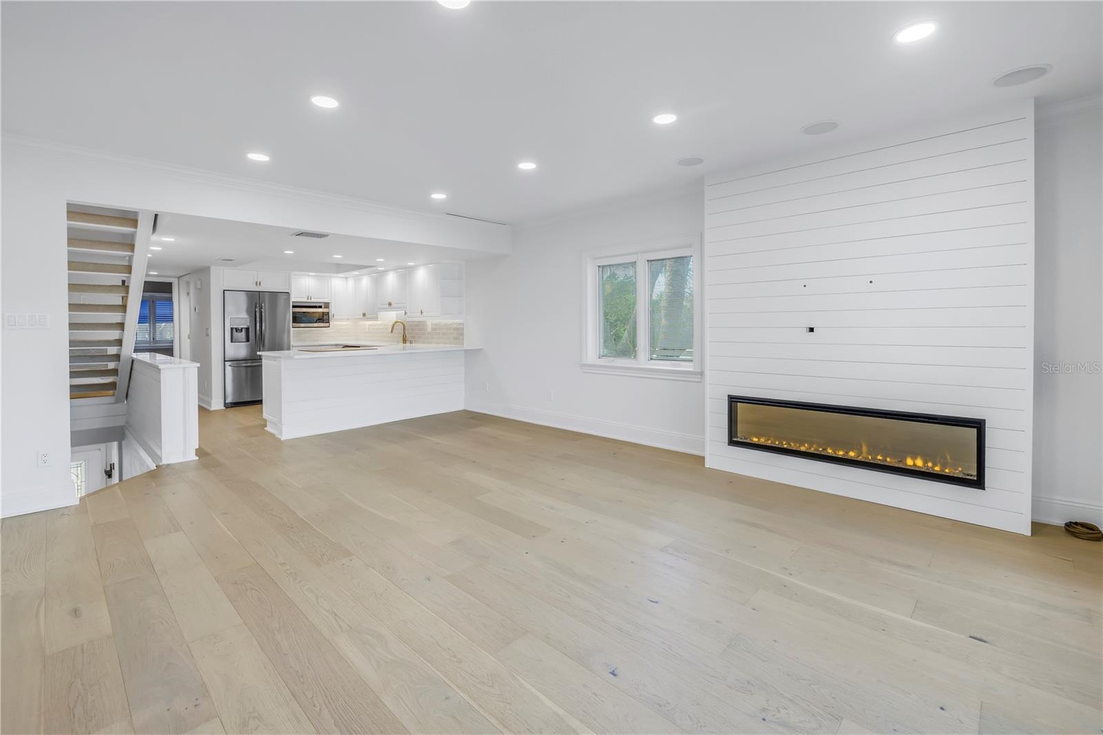 Gorgeous engineered white oak flooring throughout first living level