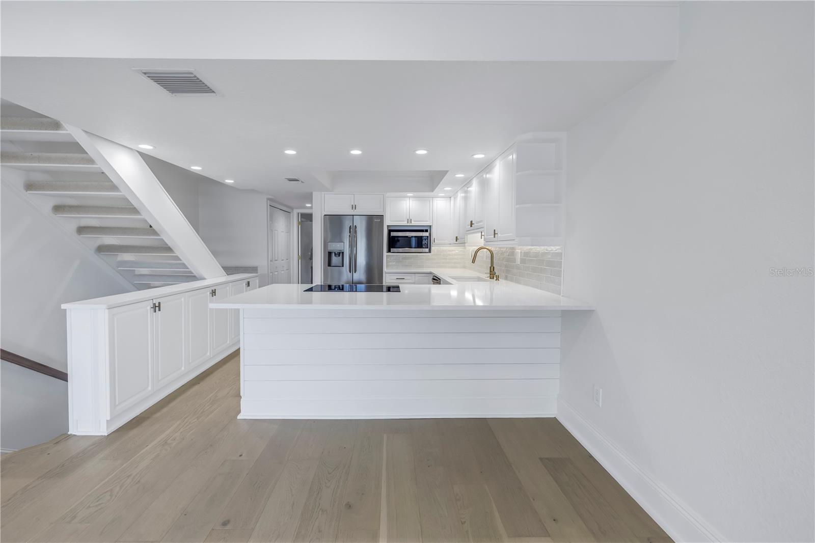 Extra cabinets with quartz countertop in the kitchen