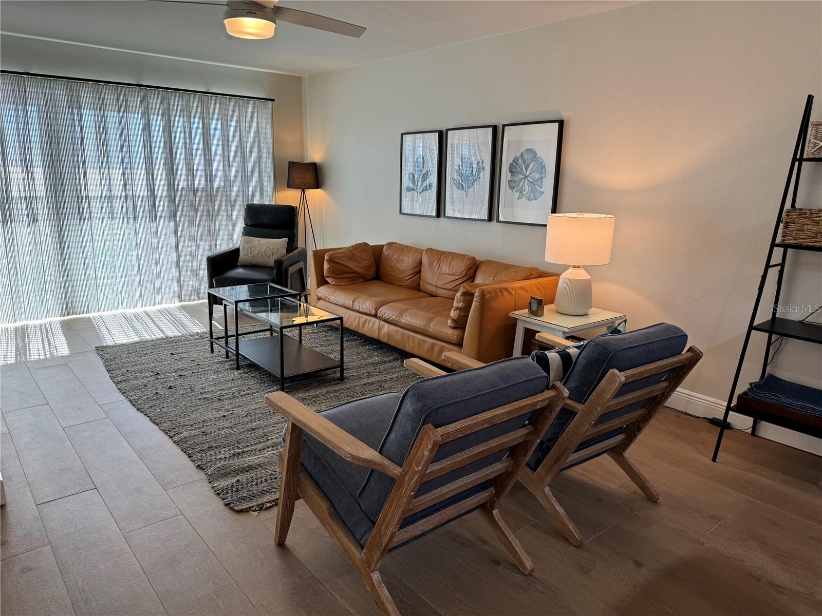 Spacious Living room with see through curtain