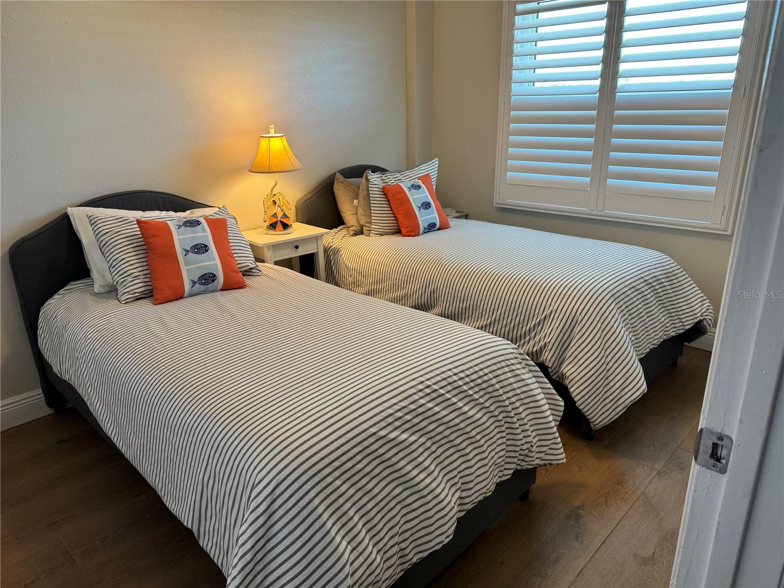 Guest bedroom  with twin beds