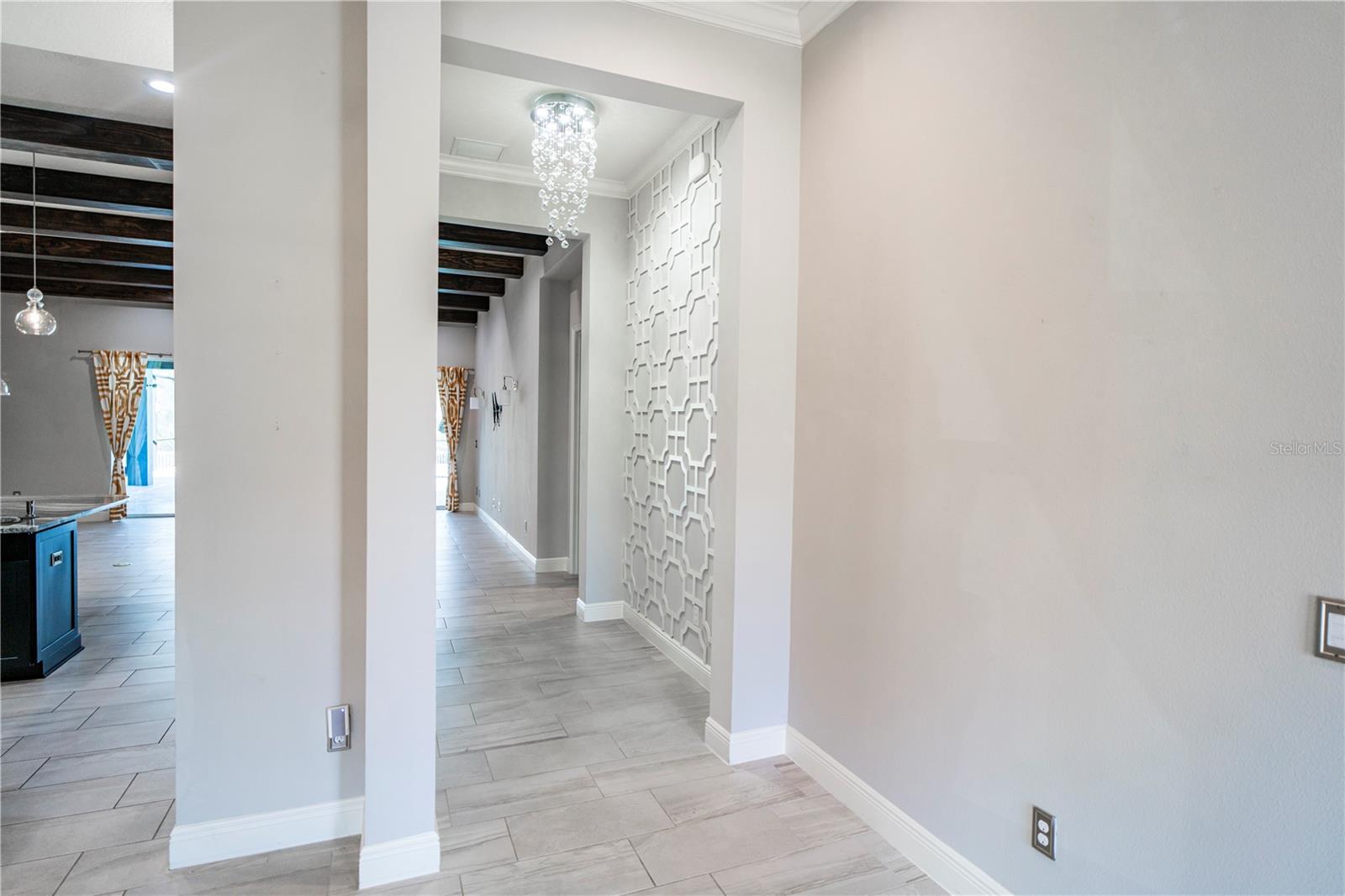 Den and hallway from formal diningroom