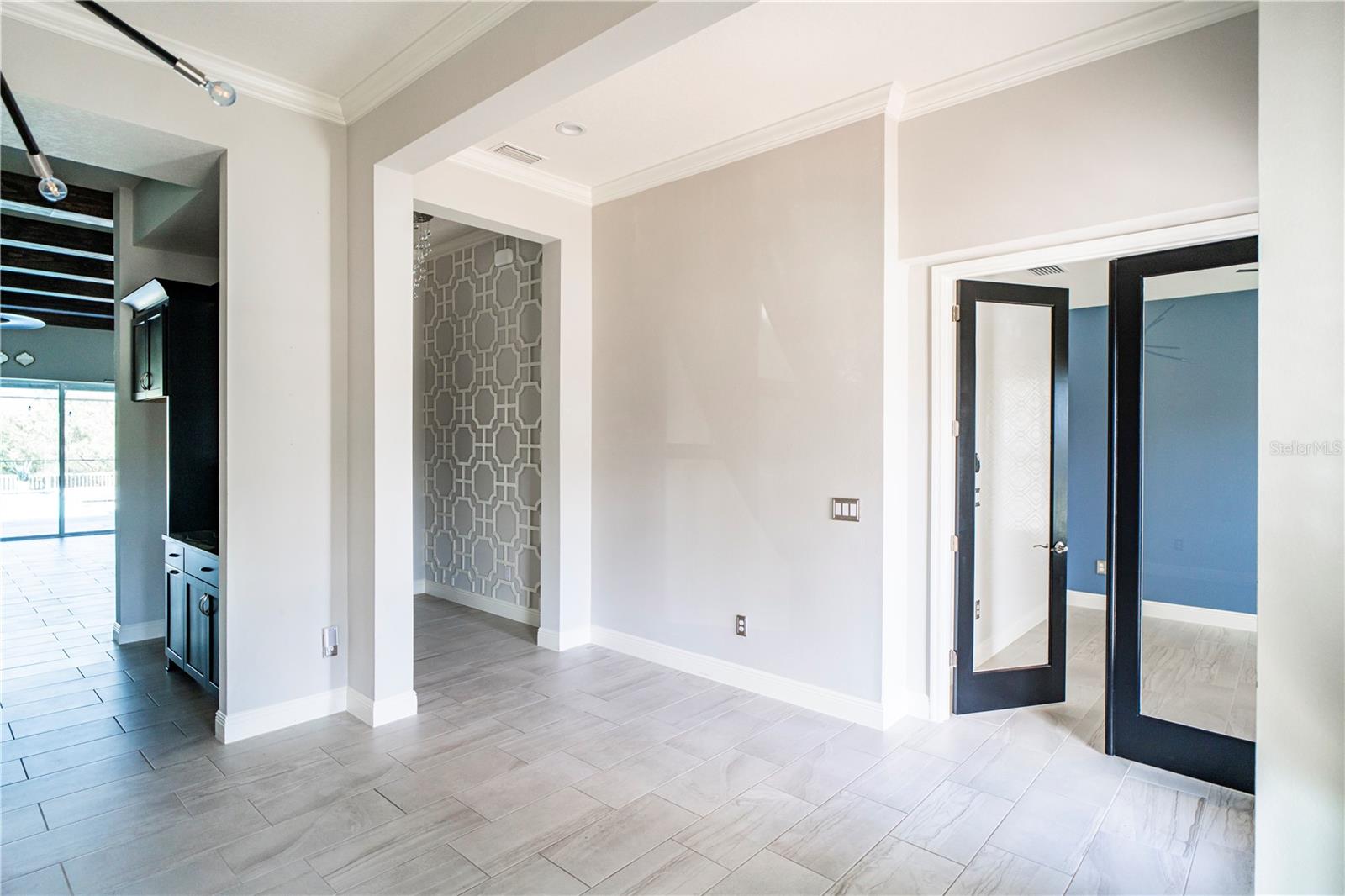 Den and hallway from formal diningroom