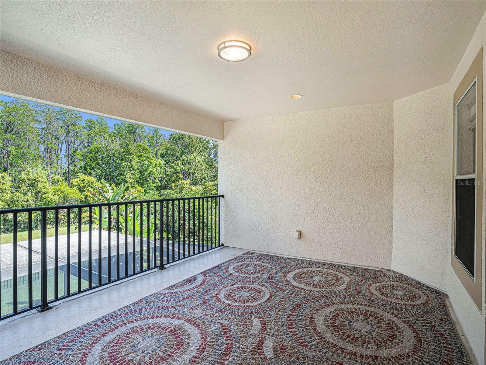 2nd Floor Balcony looking over Pool, Canal, and Conservation