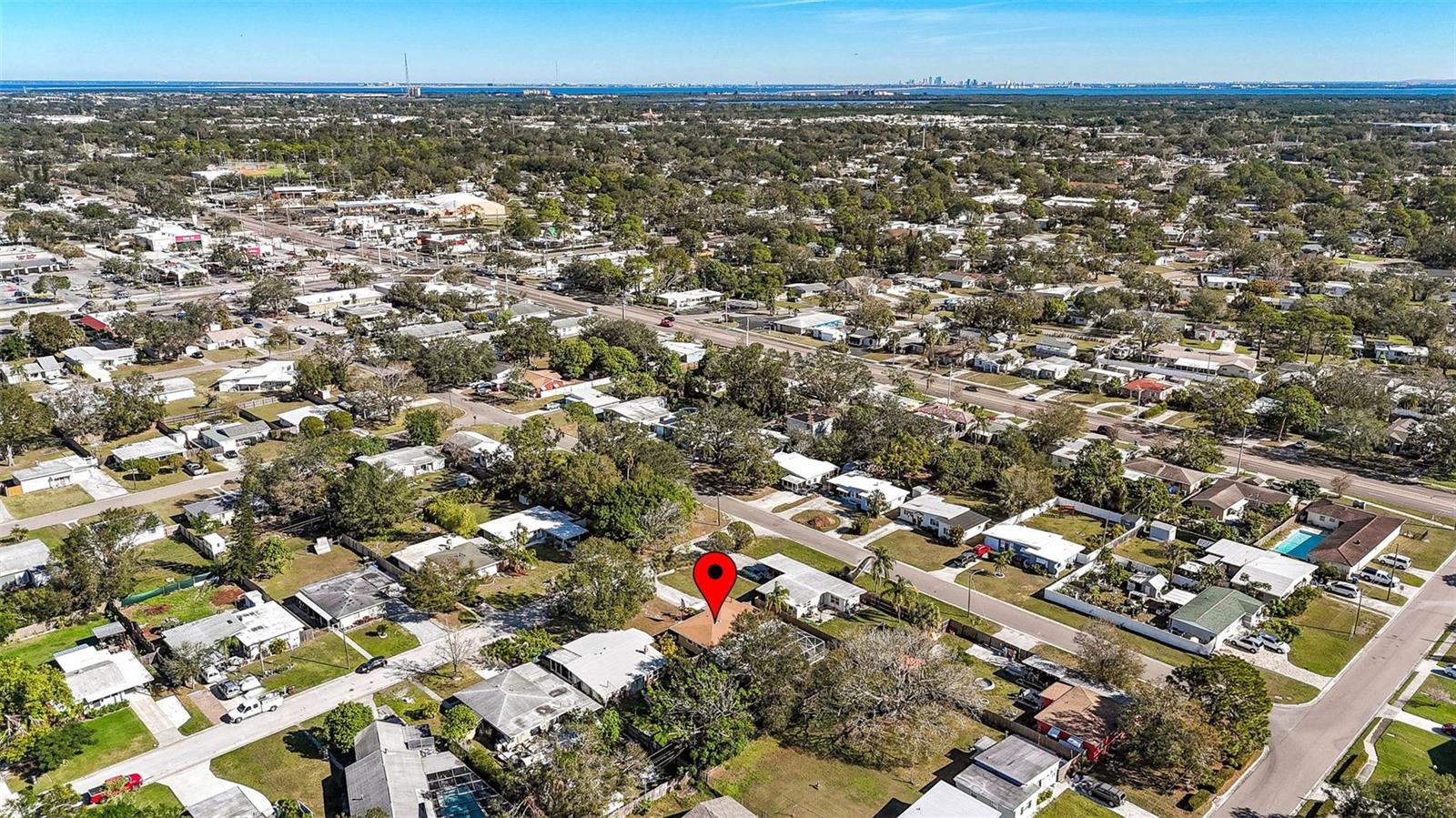 Aerial view of home & neighborhood