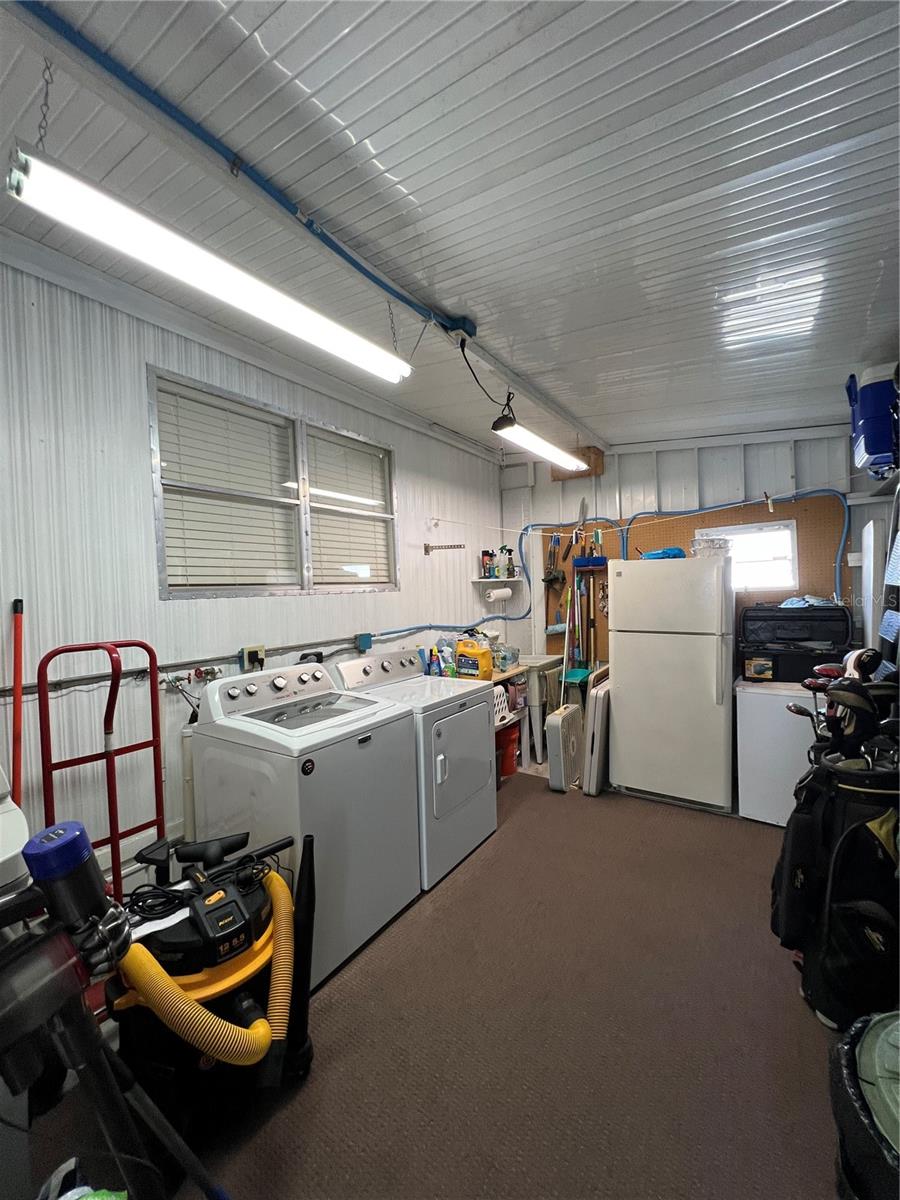 Shed with washer and dryer