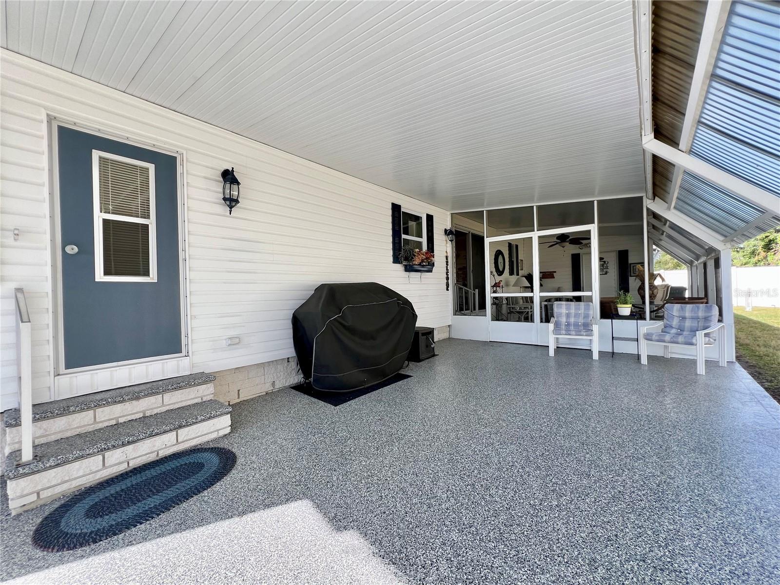 Beautiful driveway under carport!