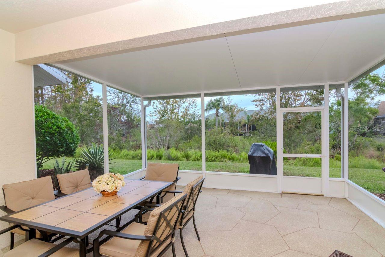 Dining area - Covered back patio with beautiful coated concrete floors