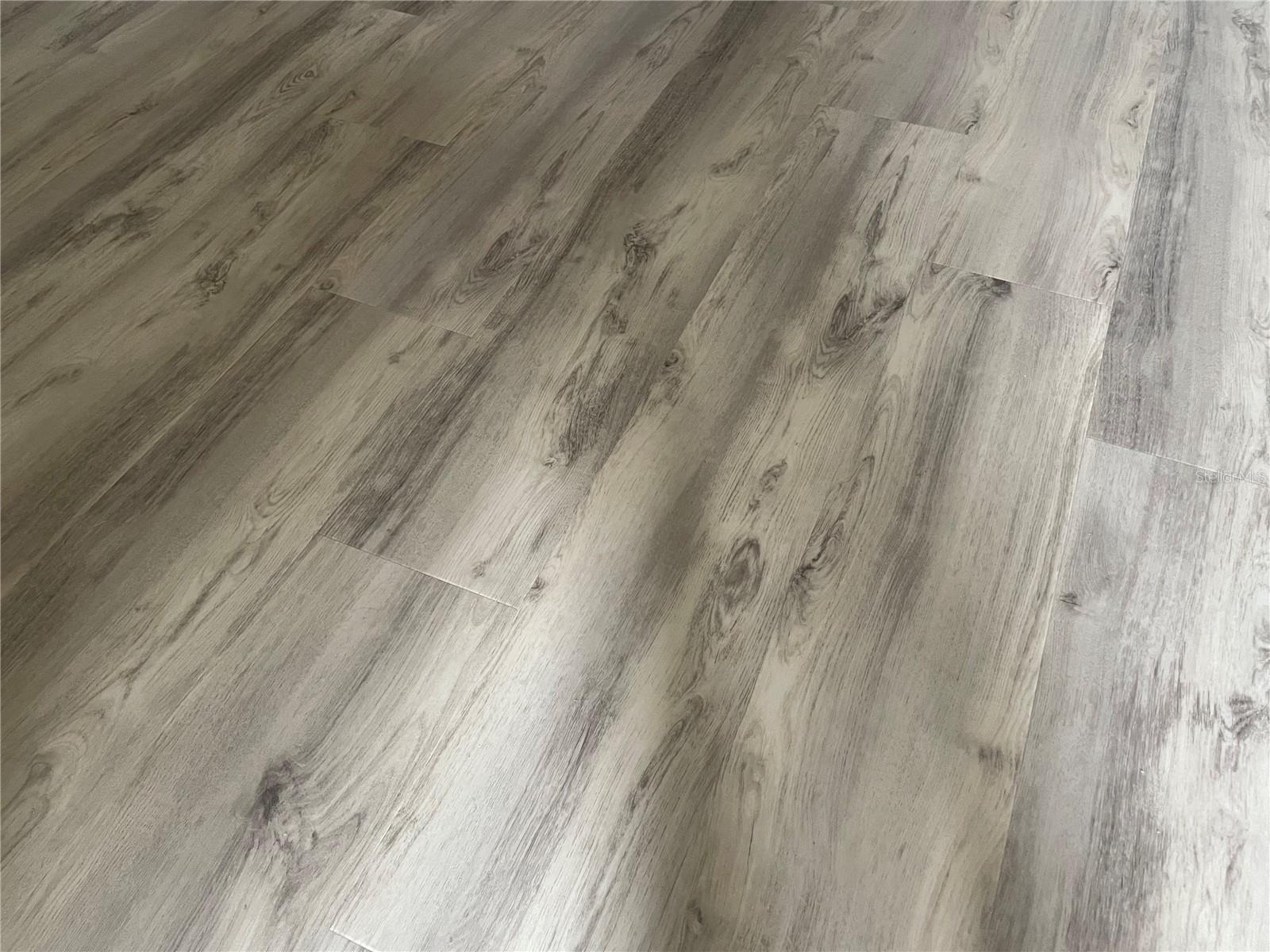 Brand new luxury vinyl flooring in main living areas