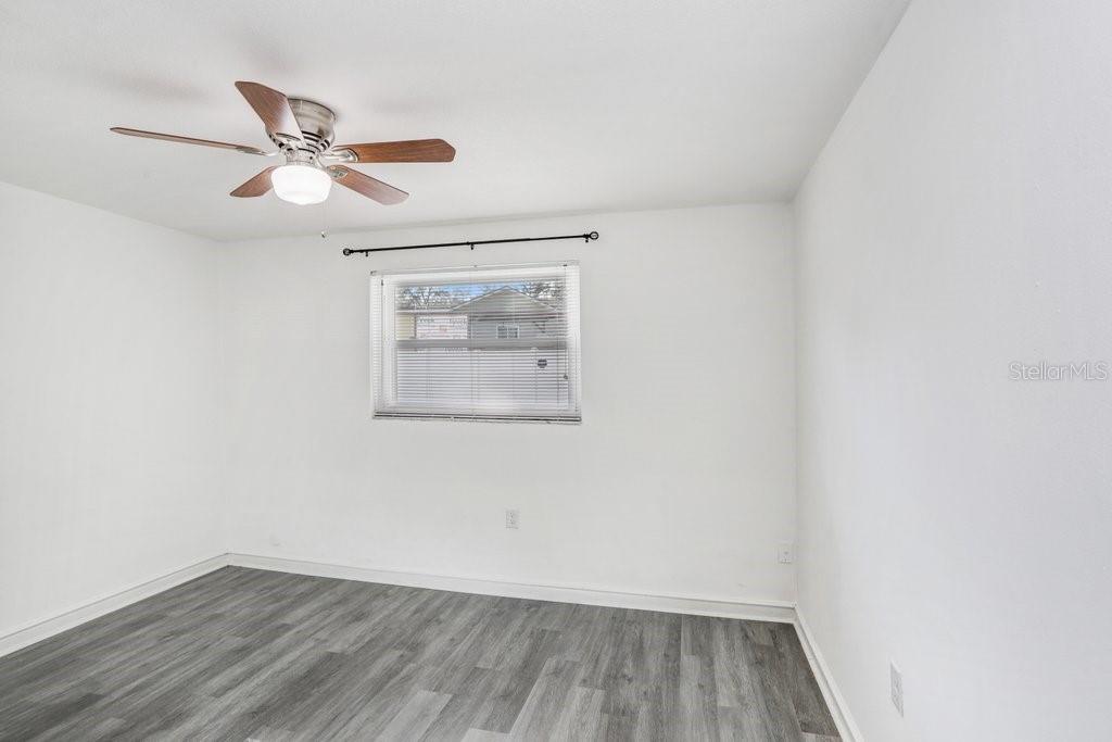 Bedroom 3 with new vinyl plank floors