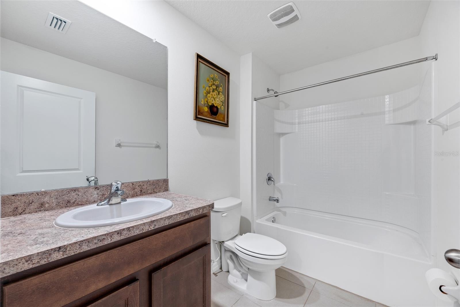 Bathroom #2 with shower/tub combination.