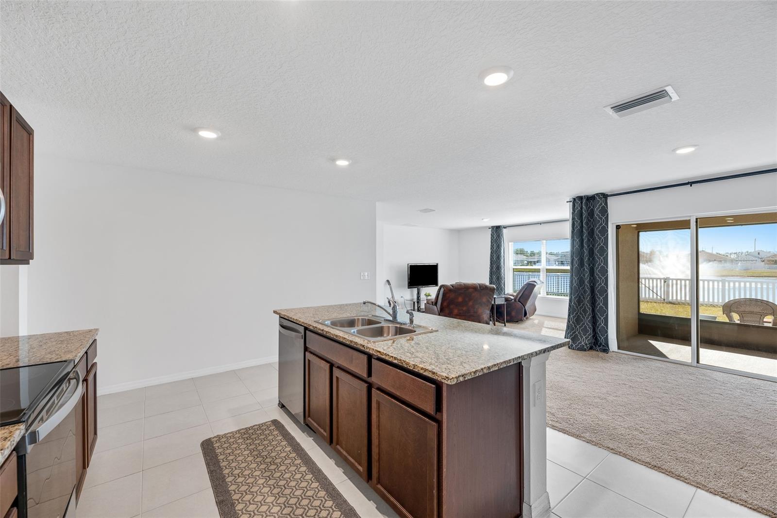 Open sight lines into dining area, living room and screened lanai and backward.