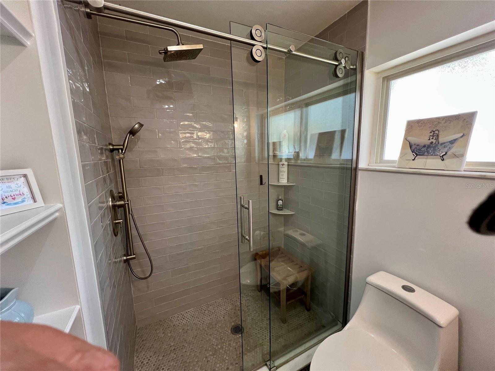 Updated bathroom with full walk in shower