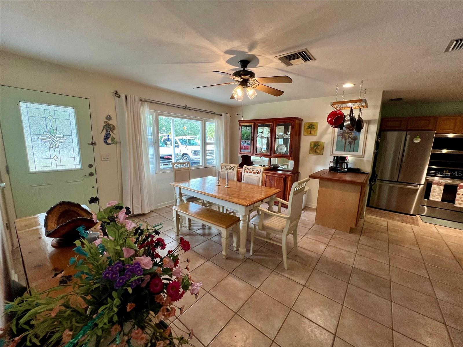 Front entry into dining area and kitchen