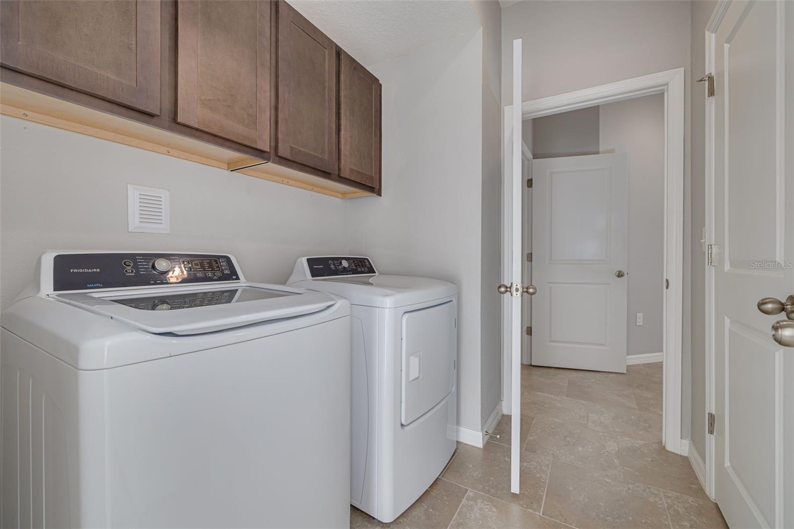 Upgraded Laundry with Cabinetry