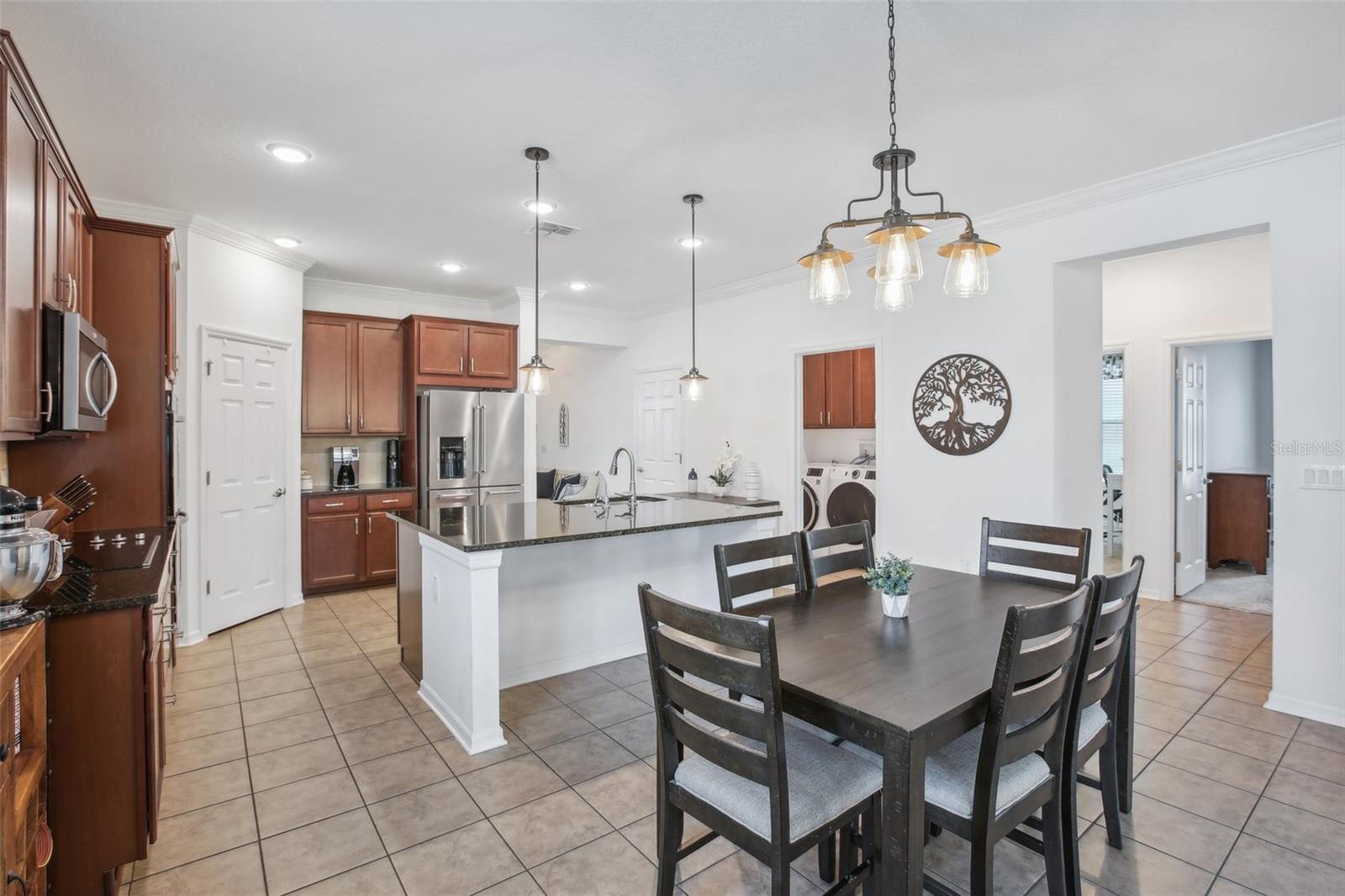 Dining room with view into kitchen