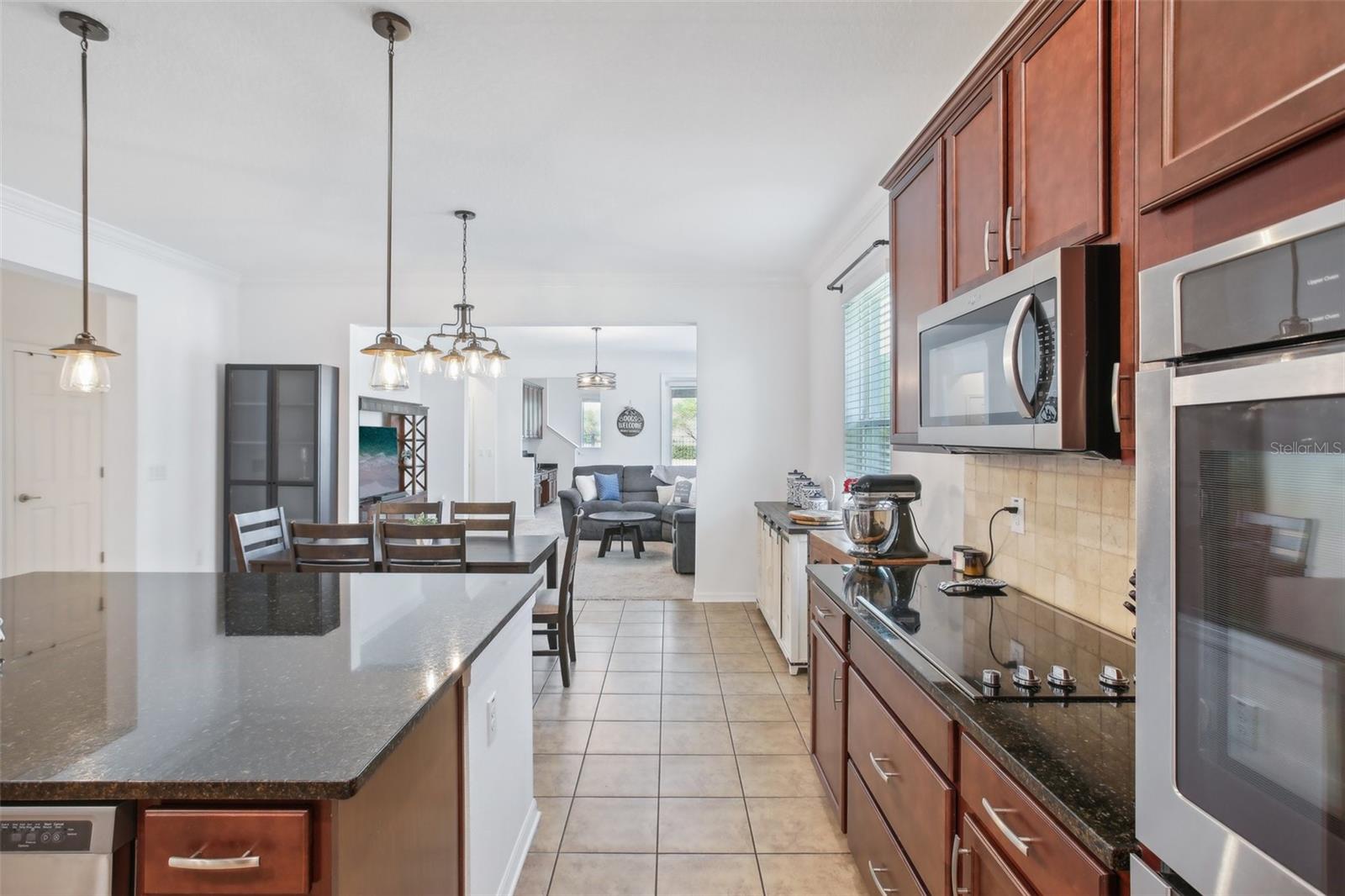 Kitchen with view to the dining room and then to the living room