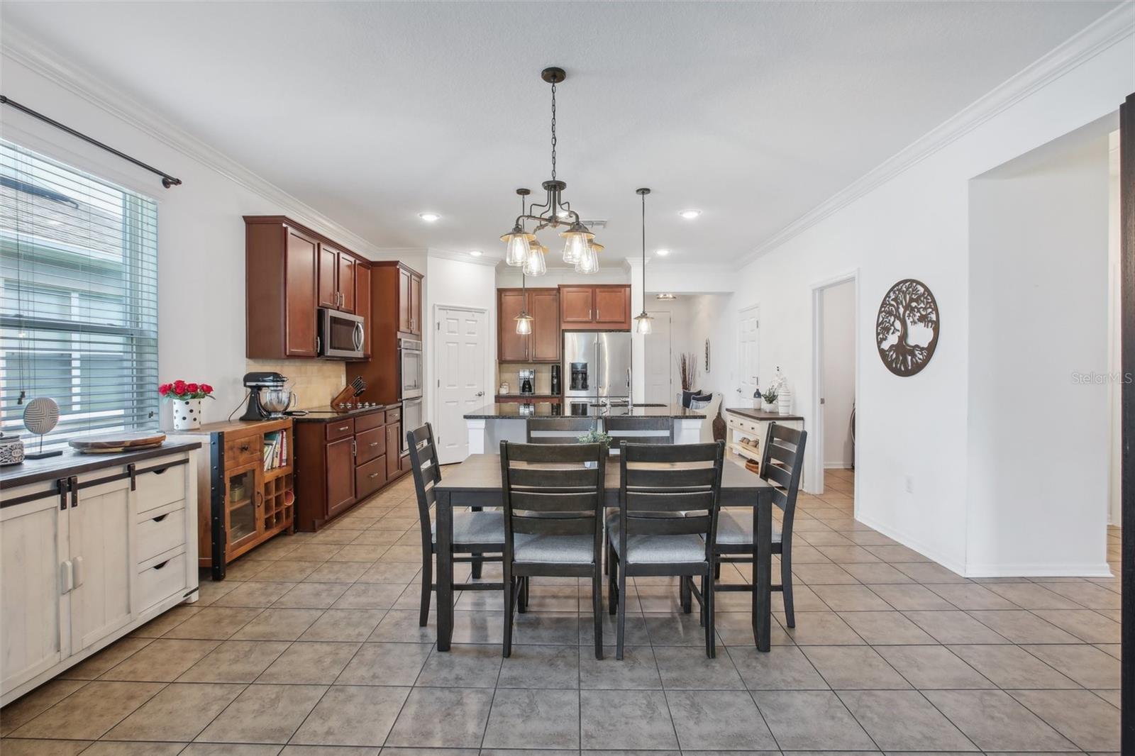 Dining room with view into kitchen