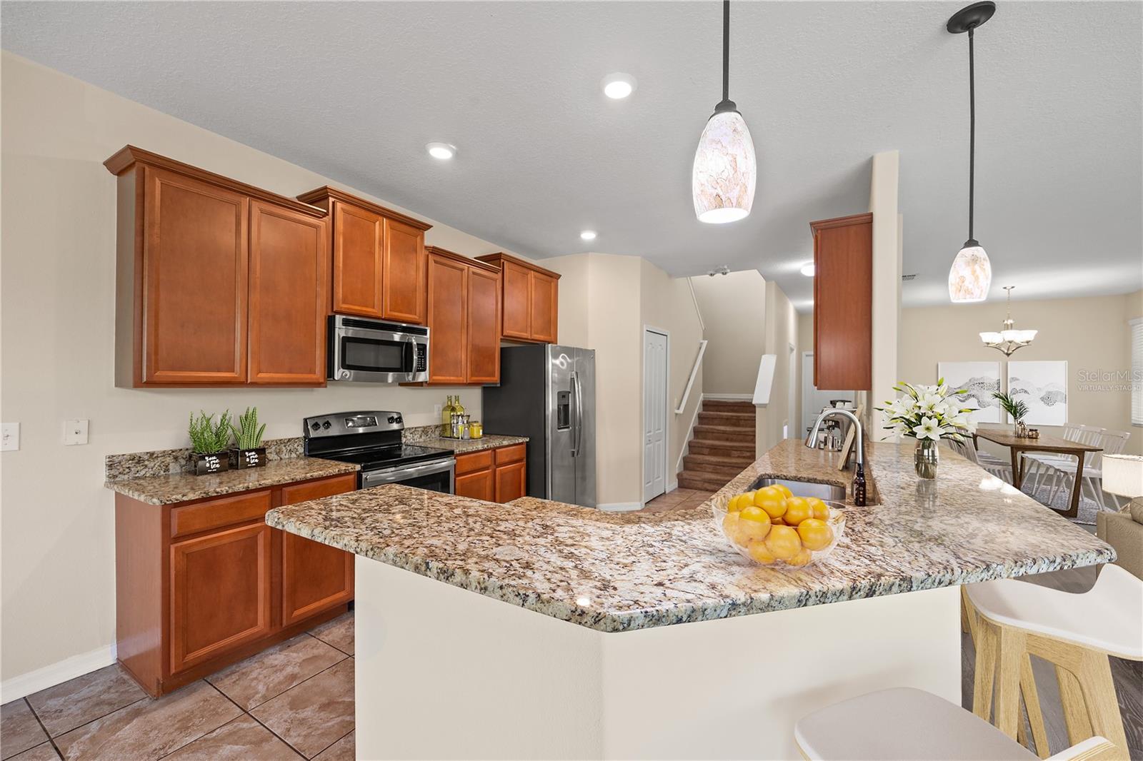 Kitchen with Breakfast Bar. Virtually Staged