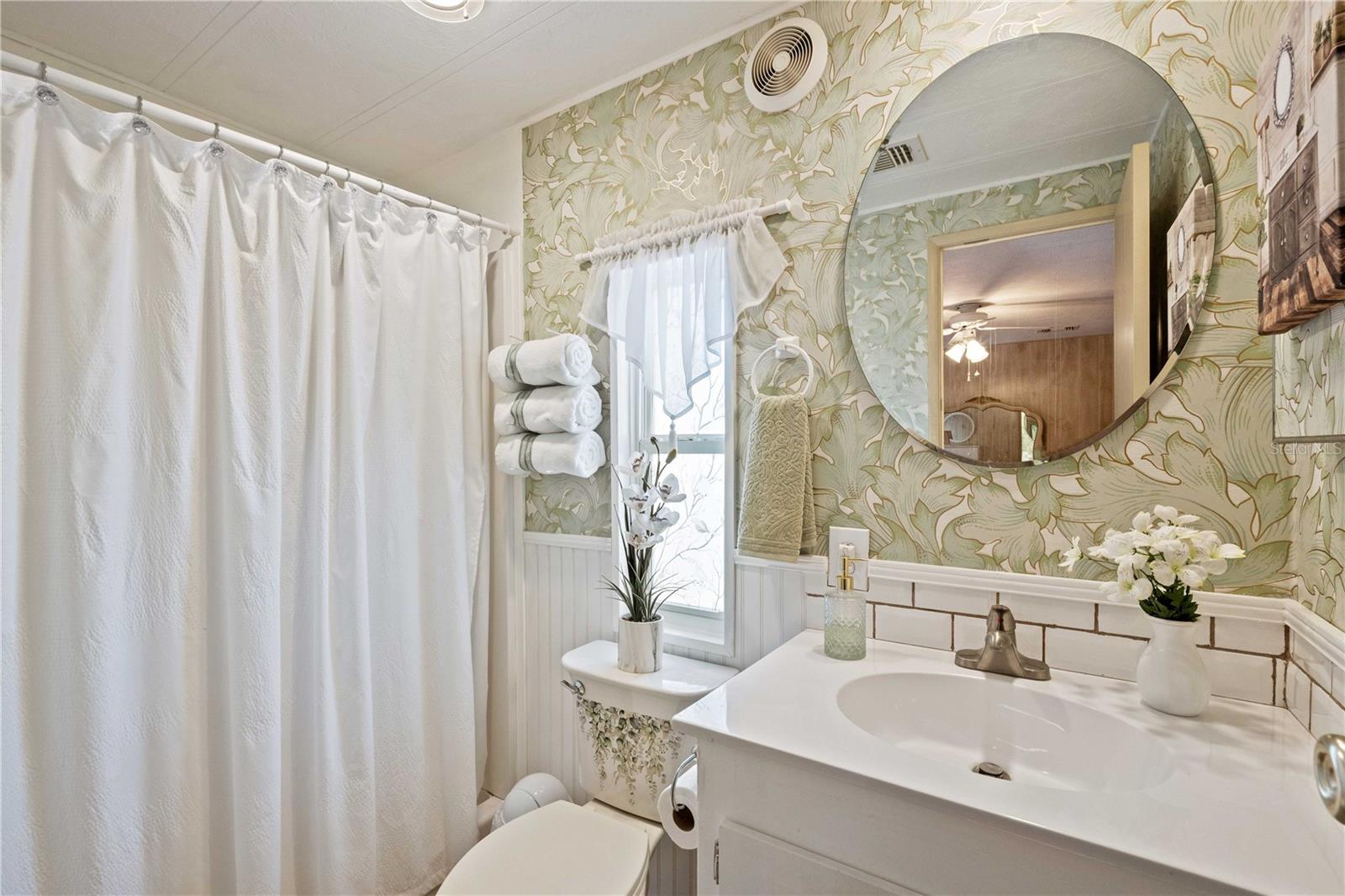 What a pretty primary ensuite bath!