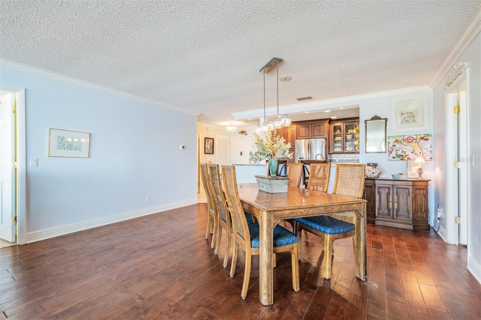 Large Dining Table area with Engineered Hardwood Flooring