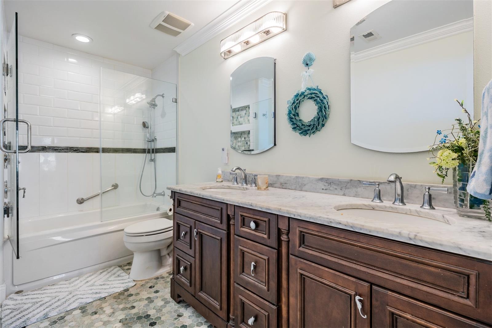 Master Bathroom - Double Vanities, Tile Flooring, New Lights and Mirrors.