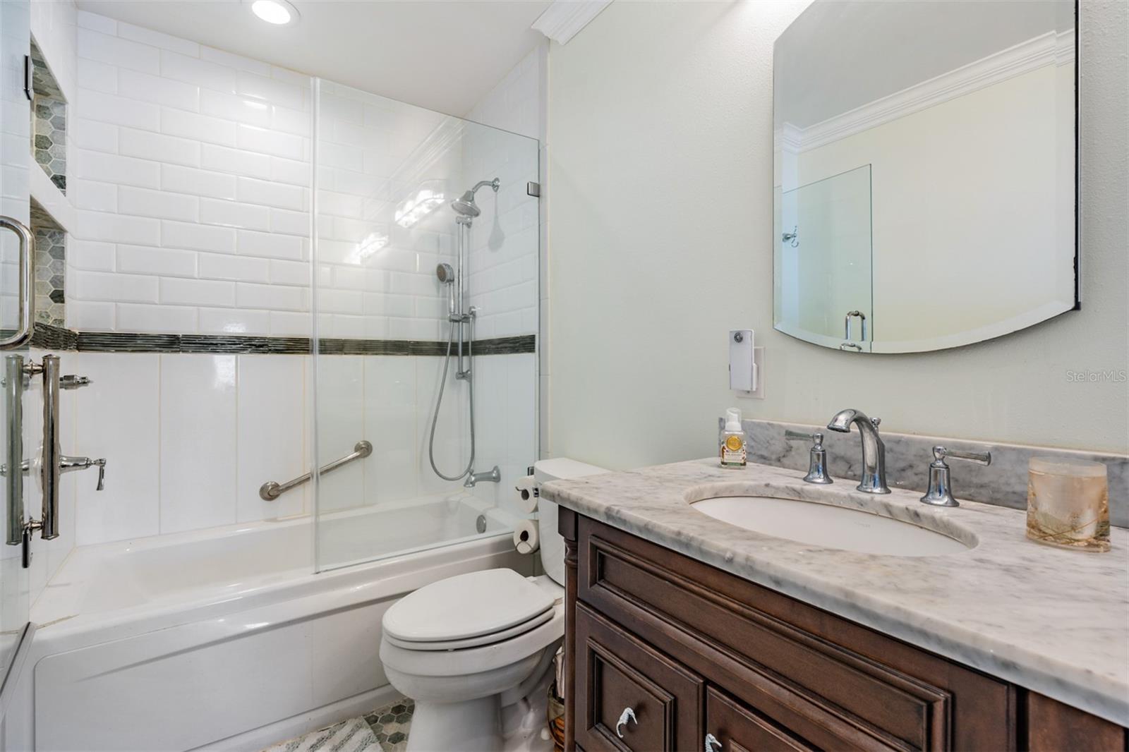 Master Bathroom - Double Vanities, Tile Flooring, New Lights and Mirrors.