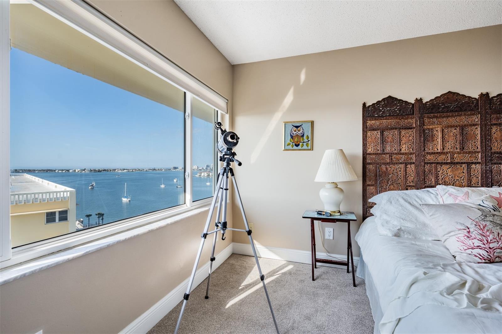 Guest Bedroom, stunning water views, new carpet and a ceiling fan.