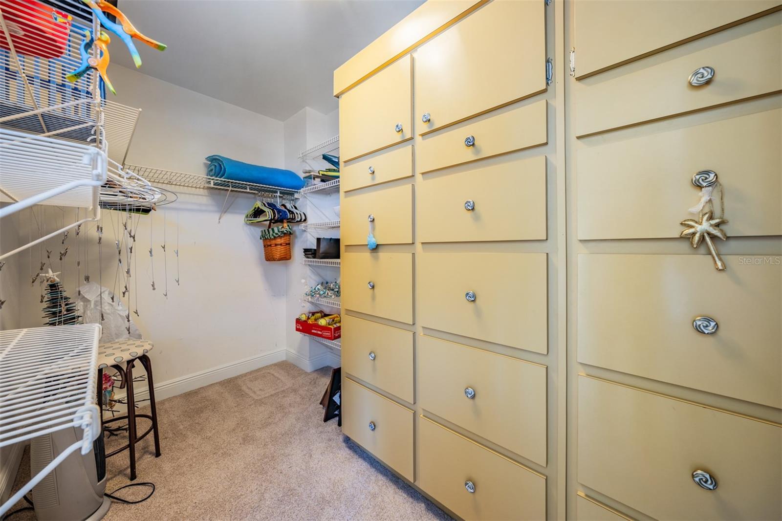 Huge Guest Room Closet with Built-in drawers and plenty of room for hanging clothes.