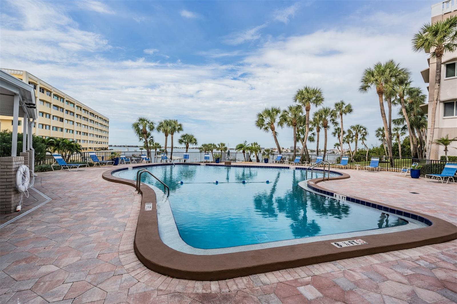 Large and Open swimming pool area, there is also a covered area to get shade from the sun.