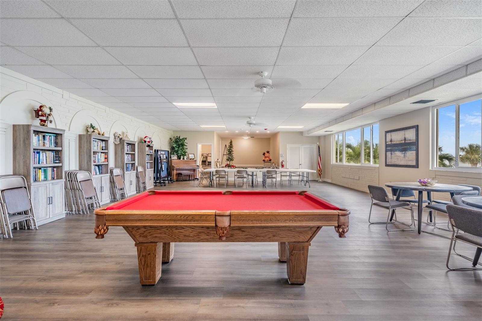 Downstairs residents activity area, Books, Card Tables, Performing Stage, Piano etc.