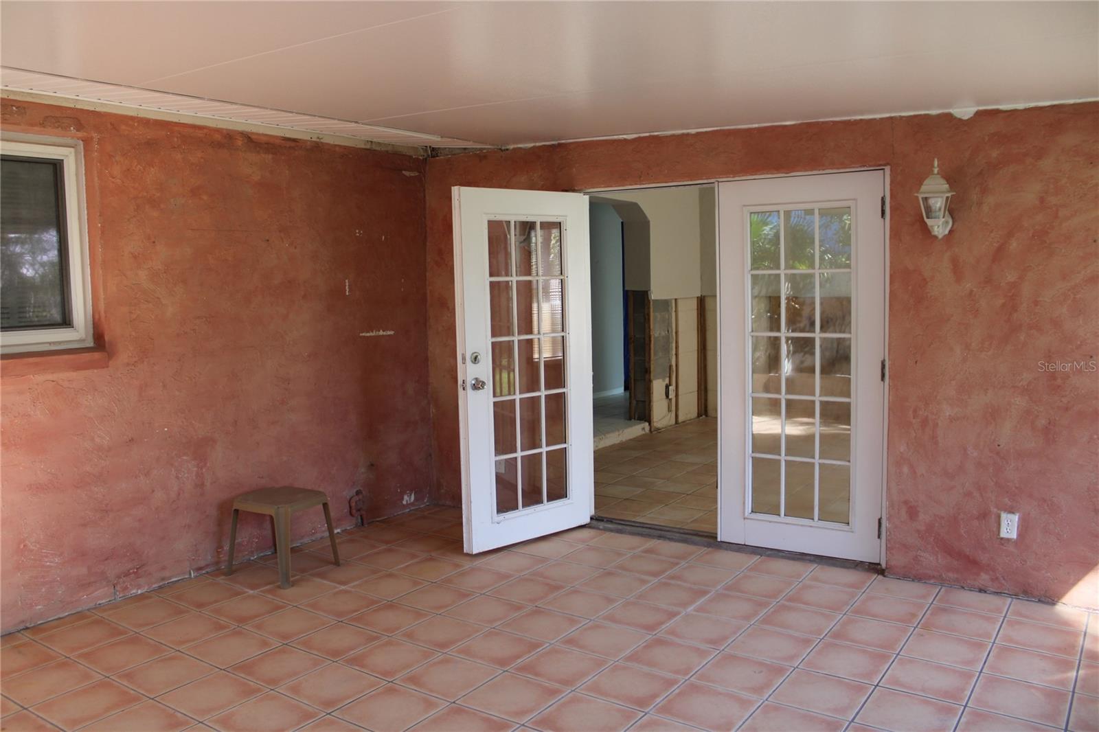 French doors coming out to patio