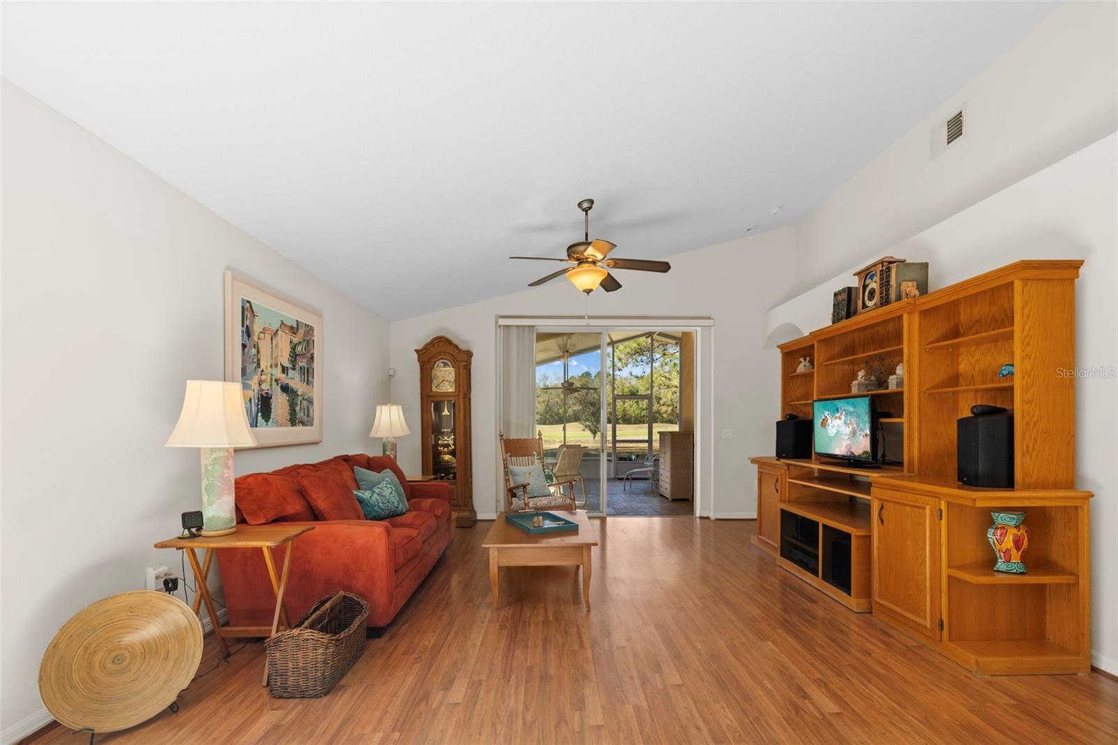 Family Room that flows beautifully into the screened in porch and office