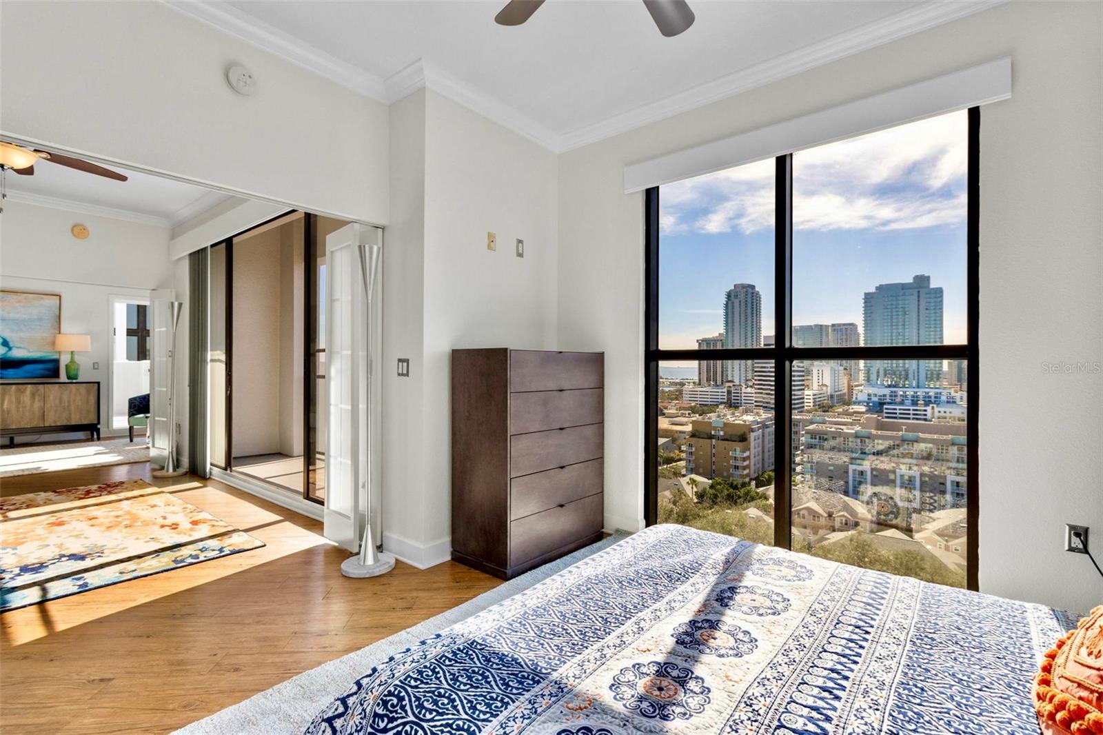 Water views from guest bedroom with sofa bed. Double door leads to #1502 private terrace space.