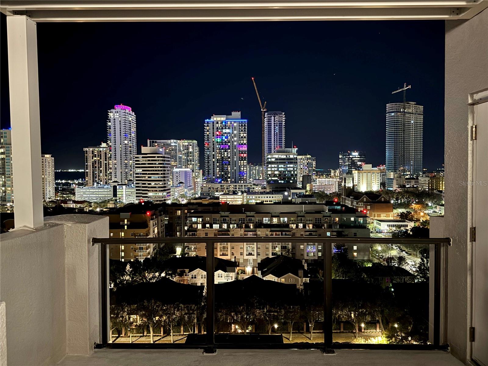 City view from #1502 Private Terrace space on the 14th level  rooftop and the twinkling city lights of DTSP.